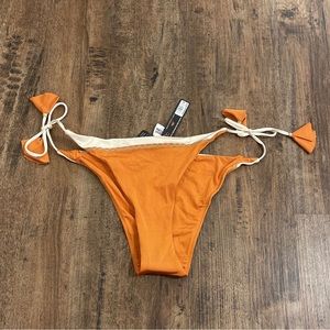 Orange swim suit bottoms. Brand new - never worn